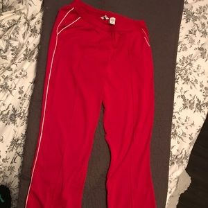 Fun vintage red track pants with white piping!